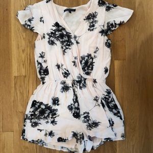 Pale pink and black floral romper